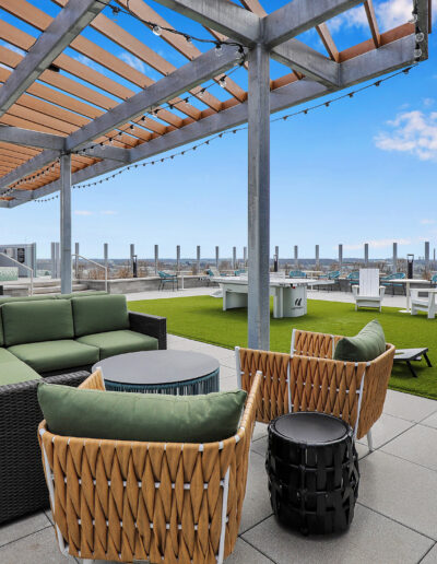 rooftop patio with lounge and pool at the abbot apartments